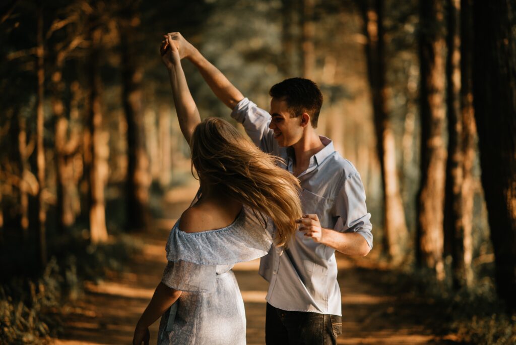 dancing couple in woods 